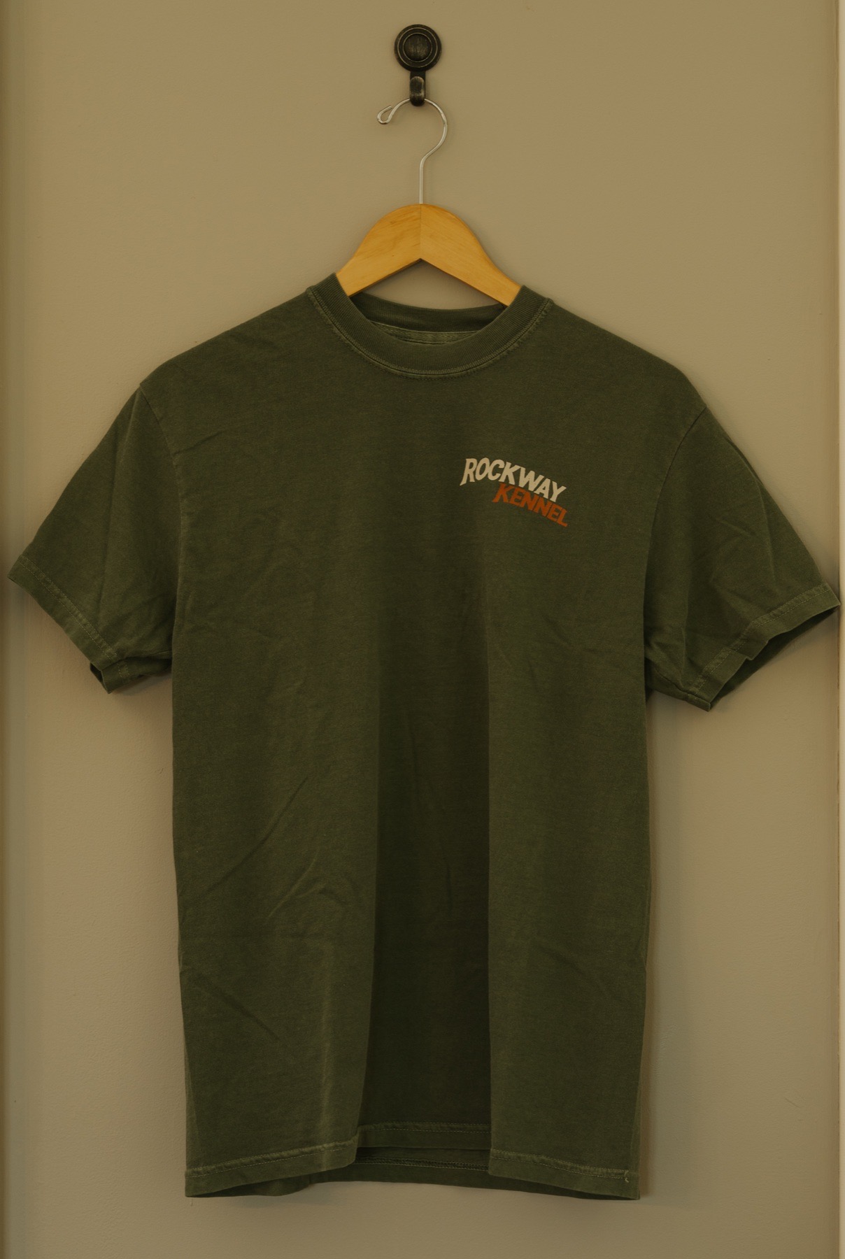 Front of the moss green Rockway tee